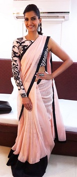 Sonam Kapoor in heavy floral embroidered single shouldered blouse