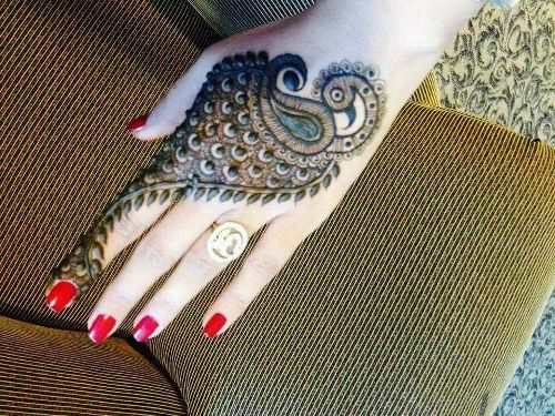 Beautiful Peacock Mehendi Design For Back Of Hand